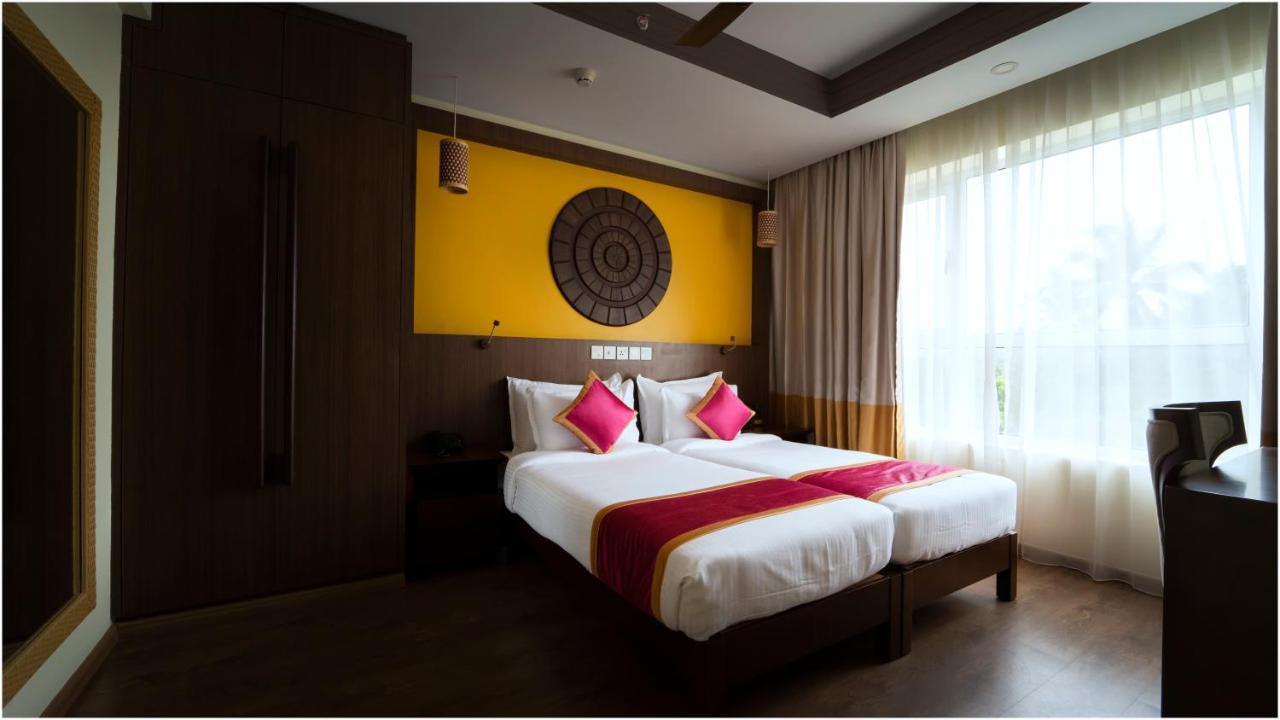 Vivin Luxury Suites Thiruvananthapuram Bagian luar foto